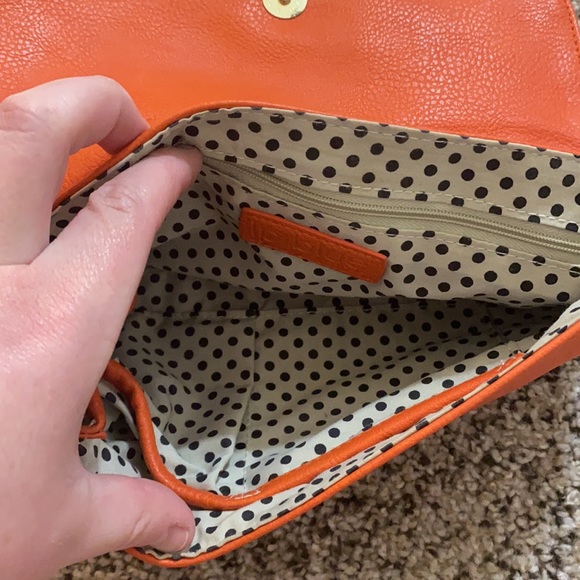 Orange fold over crossbody with gold hardware - gently used - Picture 4 of 11